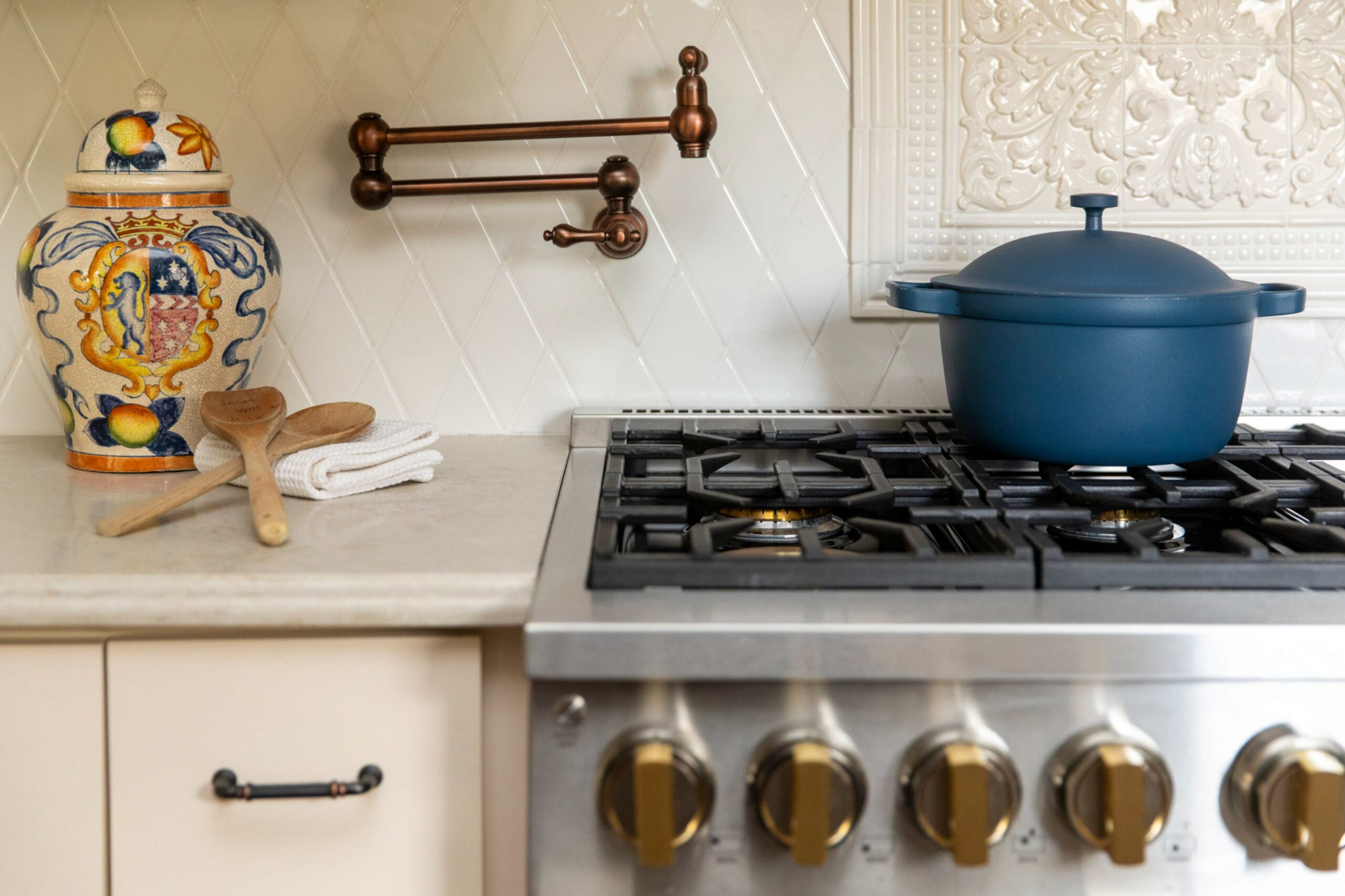 gas-range-with-copper-pot-filler-by-kate-thacker-home