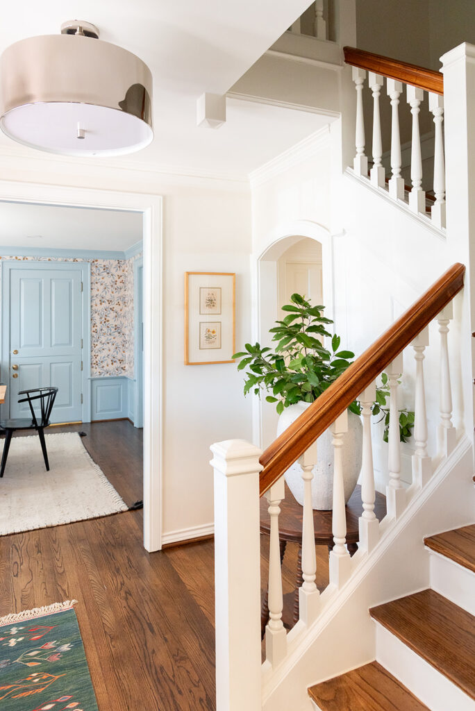 Modern Colonial Entry and Dining Room by Kate Thacker Home